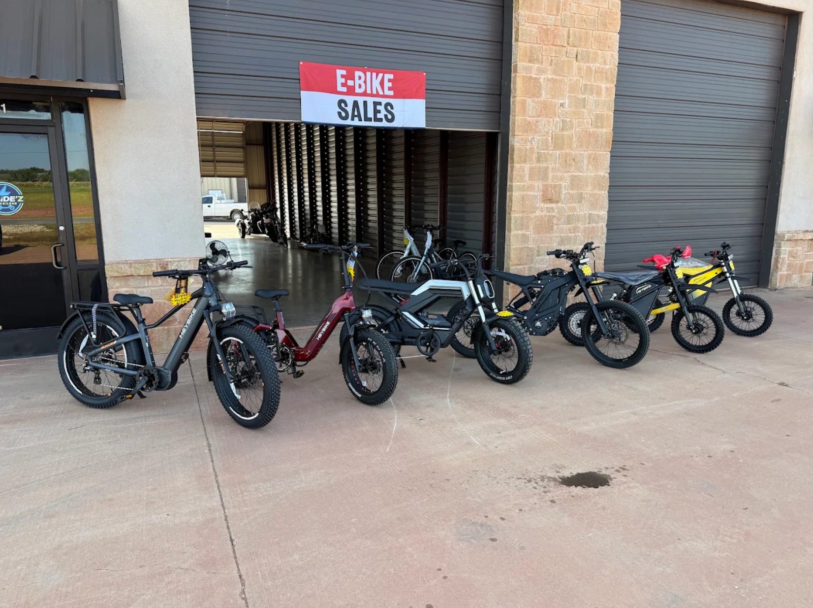 Heybike e-bikes and e-motos lined up outside the E-Ride'z showroom