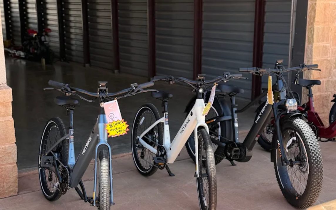 Several electric bikes arranged for comparison in an Abilene showroom